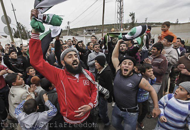 Syriske flyktninger roper slagord mot Bashar Assad i flyktningleiren Boynuyogun i Hatay-provinsen på grensen mellom Tyrkia og Syria. (Illustrasjonsfoto fra mars 2012, flickr) Syriske flyktninger roper slagord mot Bashar Assad i flyktningleiren Boynuyogun i Hatay-provinsen på grensen mellom Tyrkia og Syria. (Illustrasjonsfoto fra mars 2012, flickr)