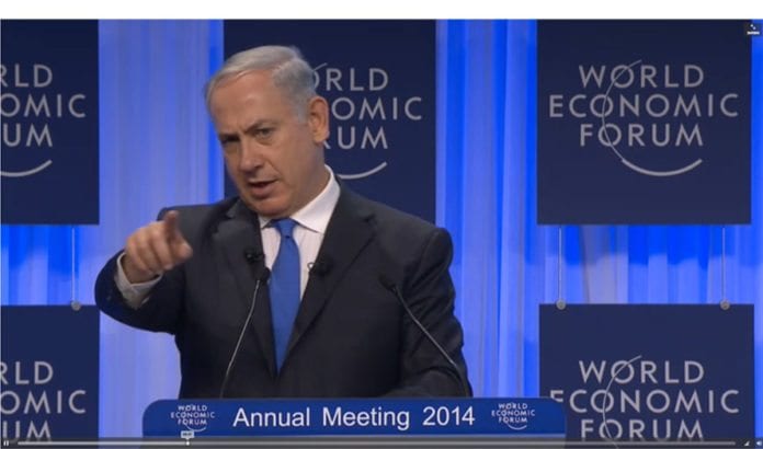 Israels statsminister Benjamin Netanyahu på talerstolen i Verdens økonomiske forum i Davos, Sveits, i dag. Foto: Skjermdump fra videooverføringen til Verdens økonomiske forum. Israels statsminister Benjamin Netanyahu på talerstolen i Verdens økonomiske forum i Davos, Sveits, i dag. Foto: Skjermdump fra videooverføringen til Verdens økonomiske forum.