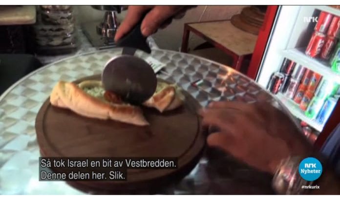 En palestinsk pizzabaker forteller historien med pizzahjul. (Skjermdump fra NRK Urix 30. september 2015) En palestinsk pizzabaker forteller historien med pizzahjul. (Skjermdump fra NRK Urix 30. september 2015)