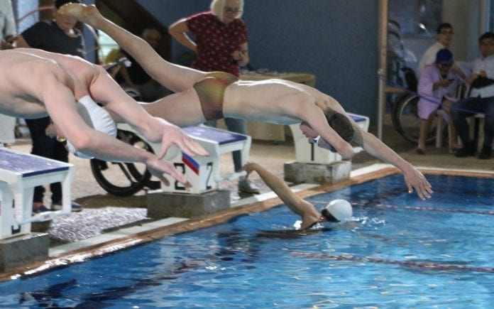 29351717_1692980260794262_1721978071508499708_o-israel-paralympic-2018-swim-champs-e1547748675256 Israelske paralympic-svømmere i aksjon i svømmebassenget Alyn i Haifa. (Foto: Israel Paralympic Committee)